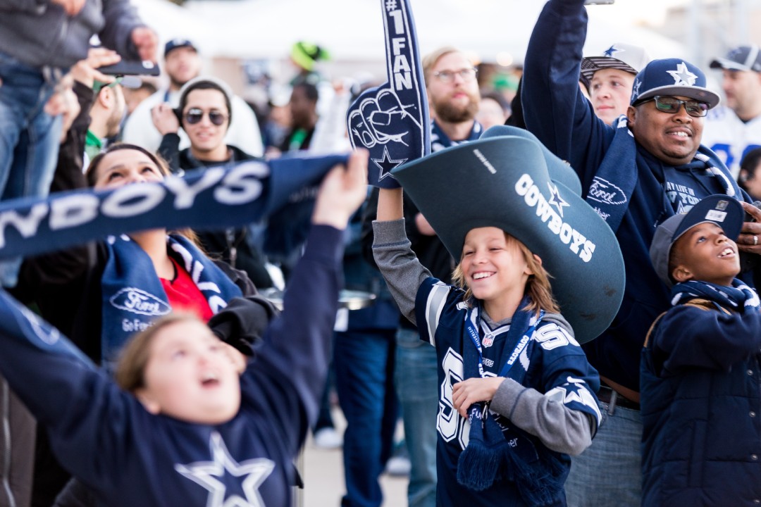 Arlington, Texas / USA - December 19, 2015: Young Dallas Cowboys Fan in a Big Cowboys Hat Outside AT&T Stadium