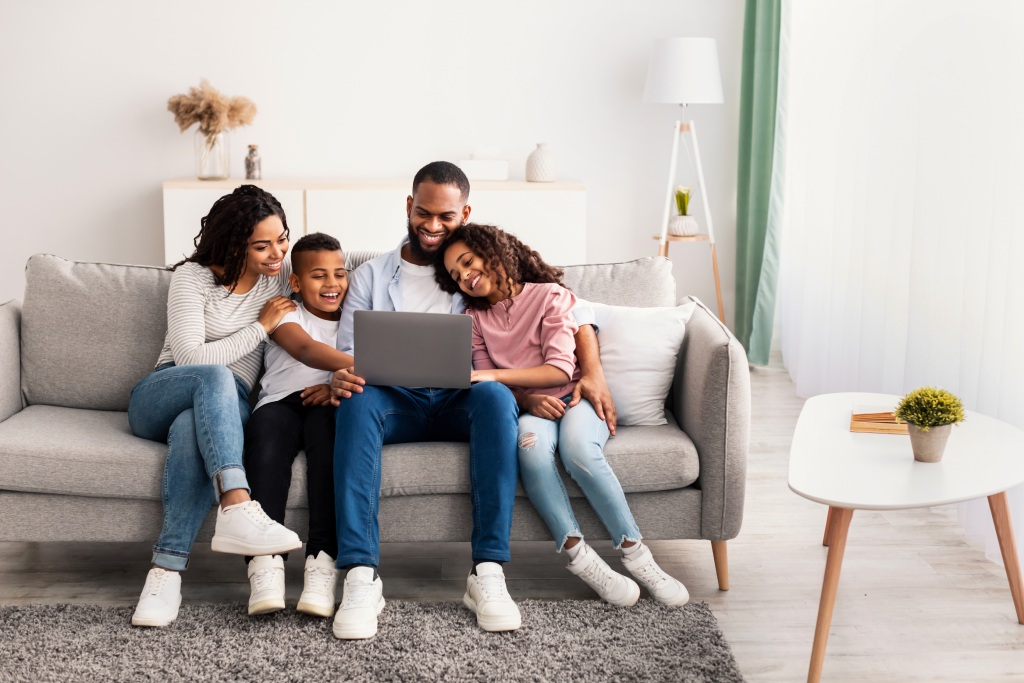 Family Weekend Portrair Of Cheerful African American Parents 